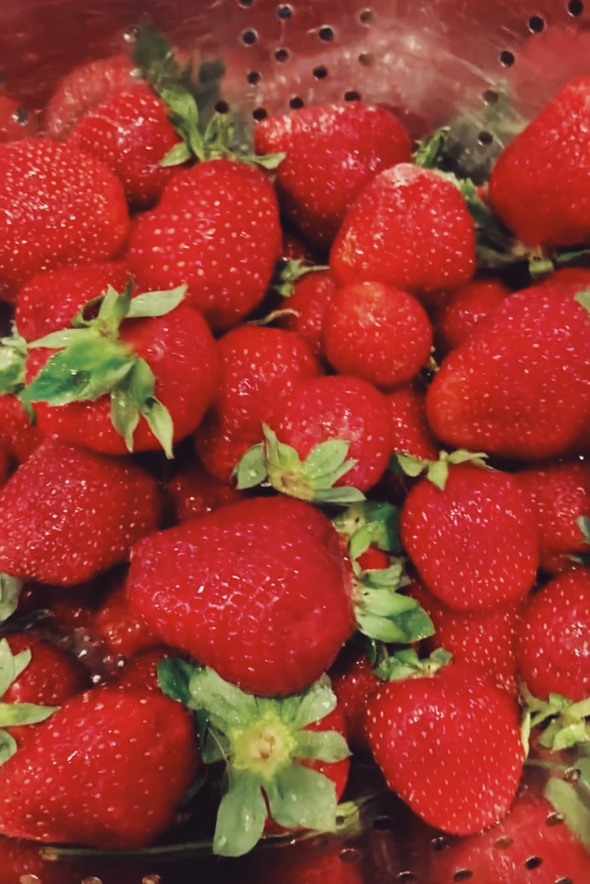 washed strawberries in a colander