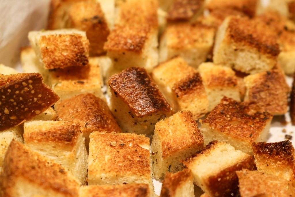 baked croutons on a tray