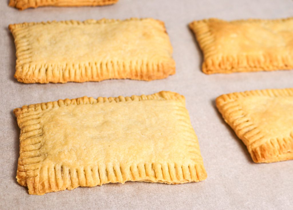 baked poptarts on parchment paper