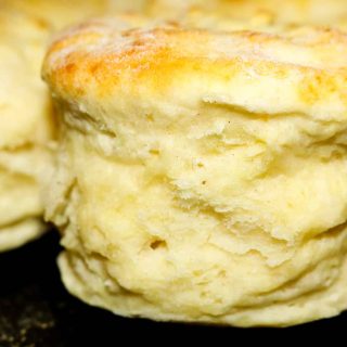 buttermilk biscuits up close on a cast iron pan