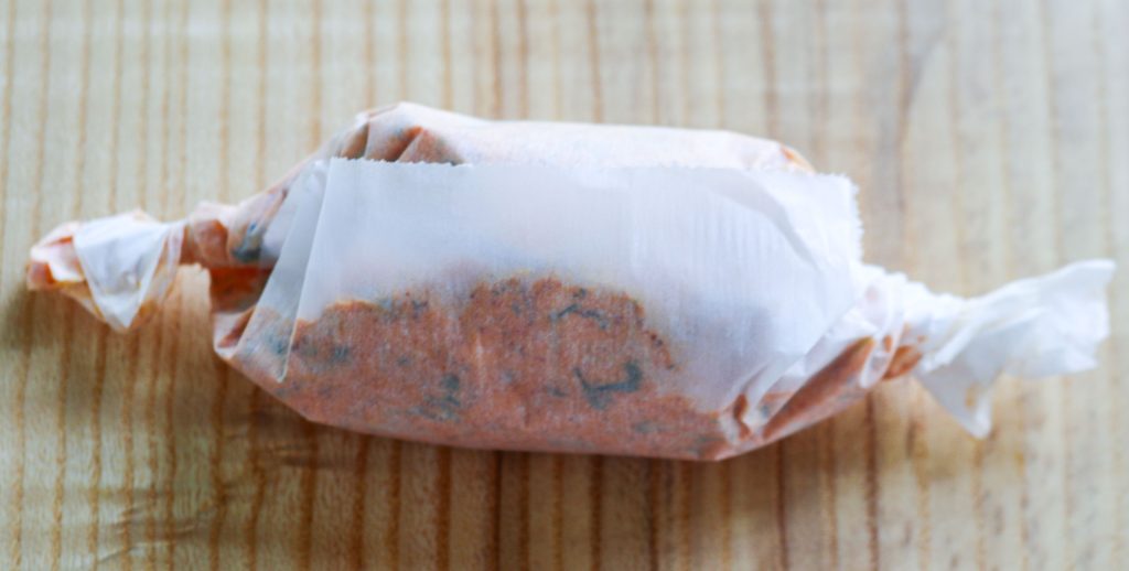 compound butter wrapped in parchment paper