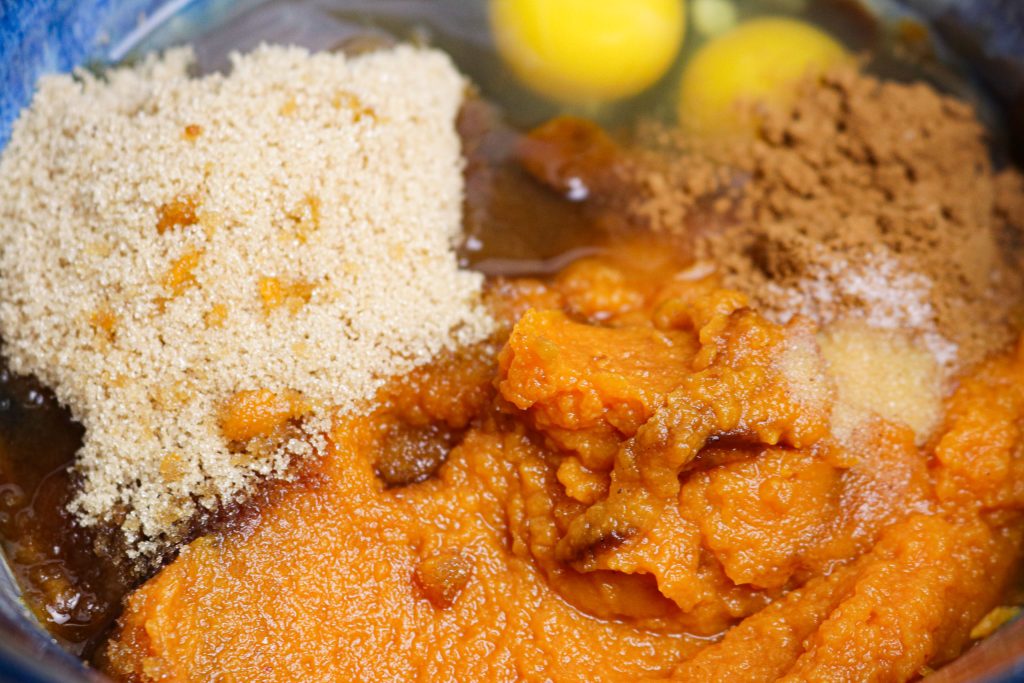ingredients for apple butter pumpkin pie in a bowl